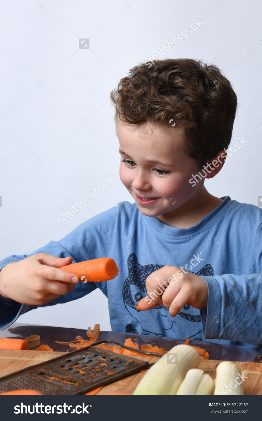stock-photo-child-cooking-596322263
