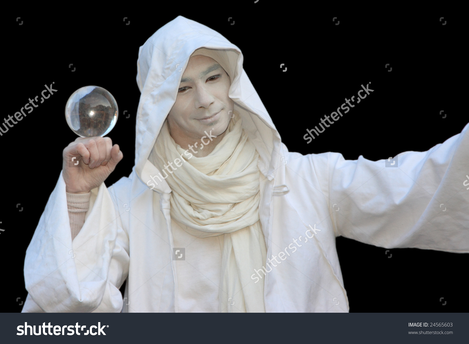 stock-photo-white-wizard-manipulating-crystal-balls-isolated-on-black-background-24565603